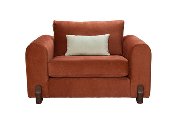 Prague Snuggler Armchair In Columbus Apricot Fabric With Cream Bolsters